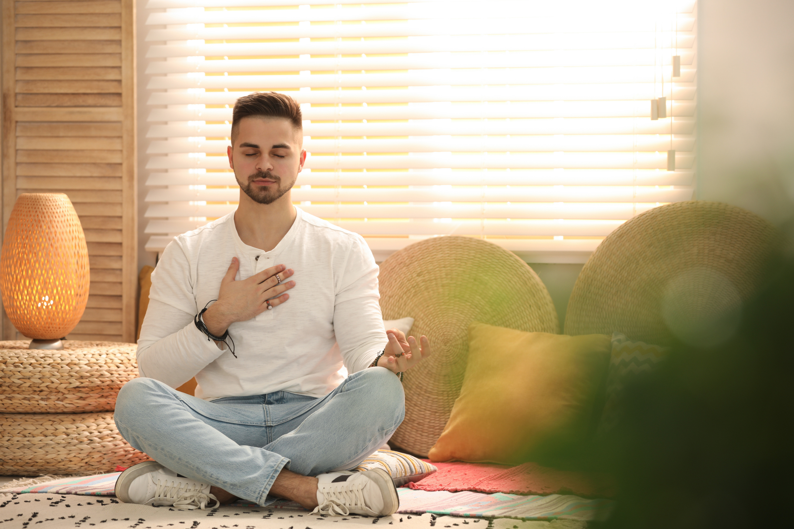 Young Man during Self-Healing Session in  Room