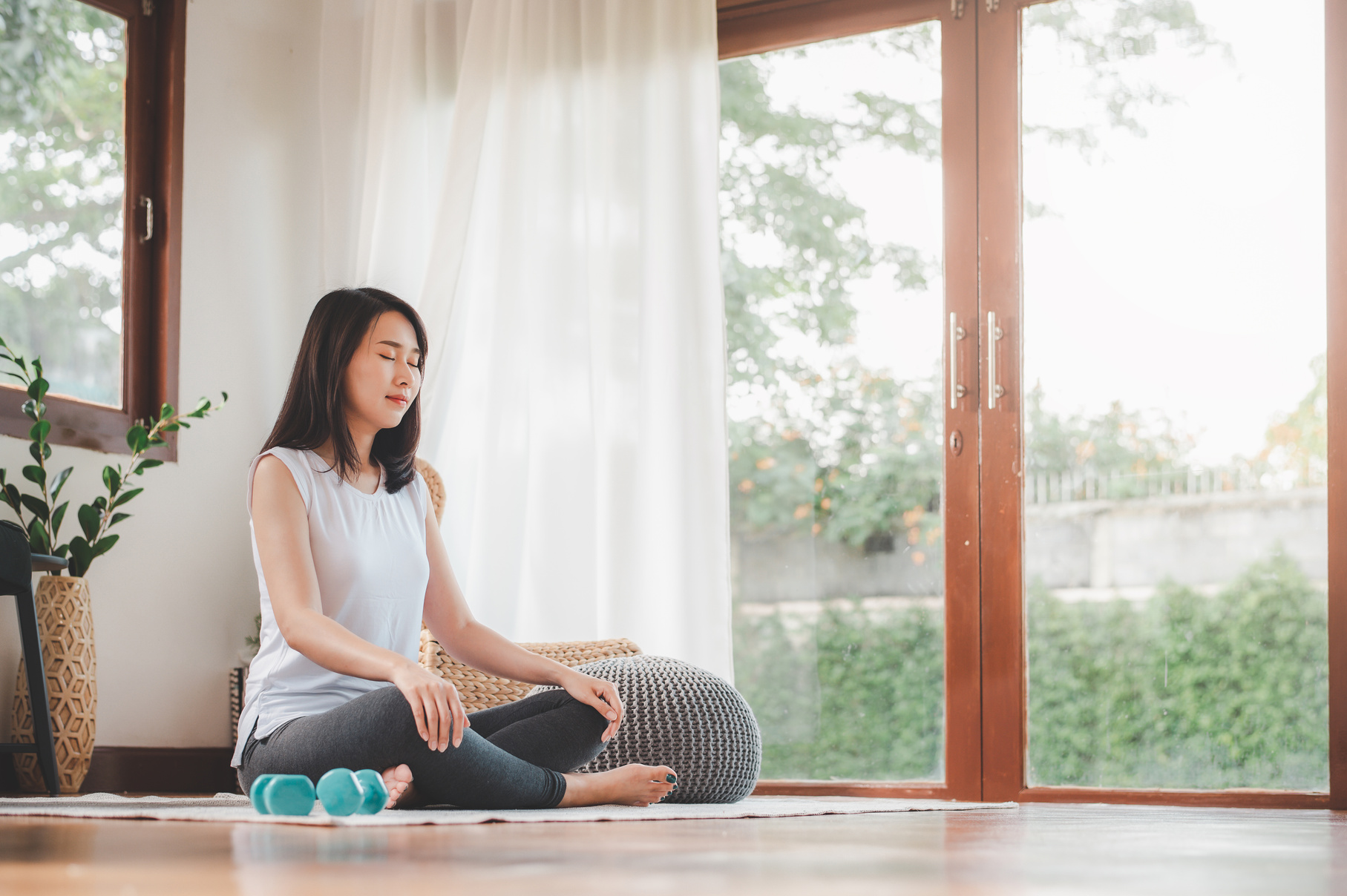 Woman Doing Yoga Meditation at Home