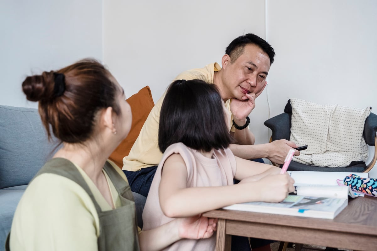Parents Helping their Child to Study